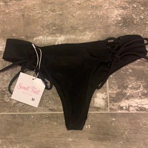 Skimpy black bikini bottom